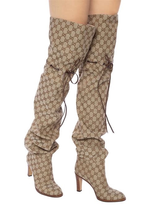 gucci monogram boots original price|thigh high gucci boots.